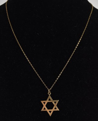 Lot 1378 - A 9ct yellow gold Star of David pendant, 2 x 2....