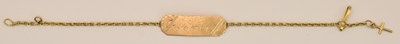 Lot 1415 - An 18ct yellow gold identity bracelet, length...