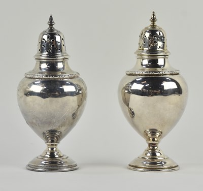 Lot 1167 - A pair of George V hallmarked silver sugar...
