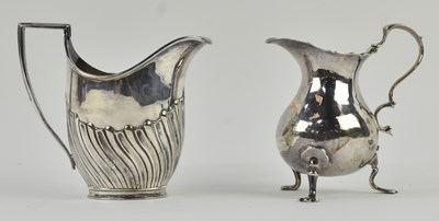 Lot 1170 - A George III hallmarked silver cream jug,...