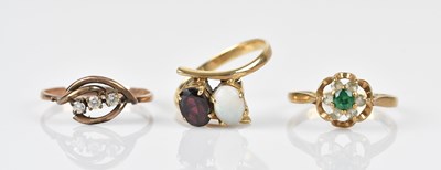 Lot 445 - Three 9ct yellow gold dress rings, including...