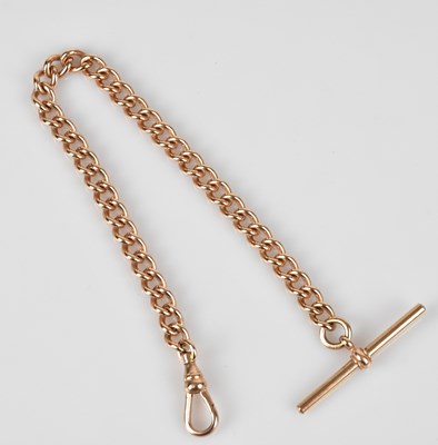 Lot 1098 - A rose metal Albert chain with T-bar stamped...