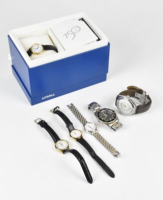 Lot 1226 - TISSOT; a lady's gold plated and stainless...