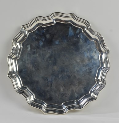 Lot 1135 - A George V hallmarked silver salver,...