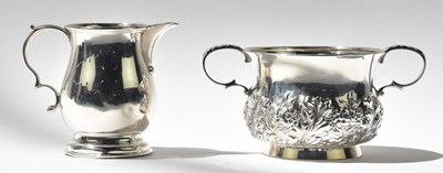 Lot 1186 - An Edward VII hallmarked silver twin handled...