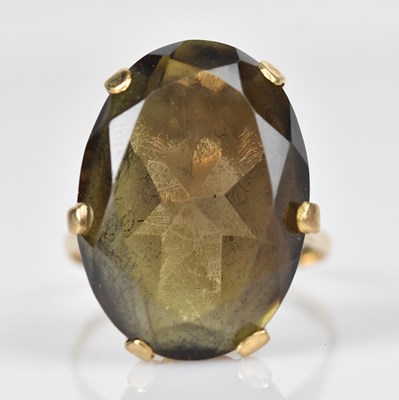 Lot 571 - A 9ct yellow gold mounted smoky quartz dress...