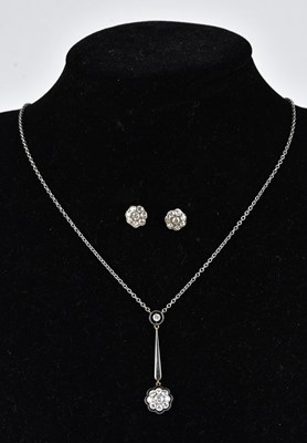 Lot 214 - A good Art Deco yellow and white gold diamond...