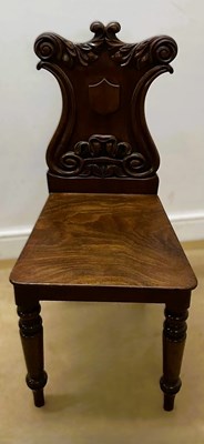 Lot 730 - A 19th century mahogany hall chair, having a...