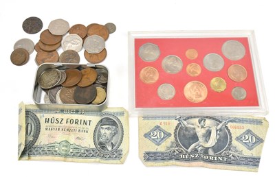 Lot 650 - A small collection of mixed coins including a...