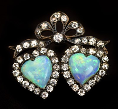 Lot A late Victorian white metal opal and diamond...