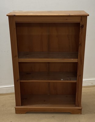 Lot 738 - A pine open three shelf bookcase, height 122cm,...