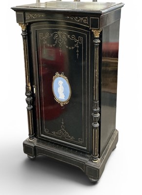 Lot 54 - A late 19th century French ebony gilt metal...
