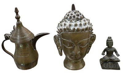 Lot 1102 - An early to mid 20th century Thai gilt metal...