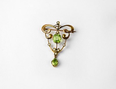 Lot 997 - An Edwardian 9ct yellow gold filigree pendant...