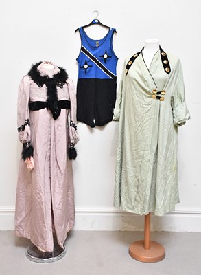 Lot 1455 - A long pink silk Victorian c1890s walking coat,...