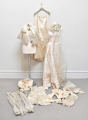 Lot 1456 - A Victorian late 19th century cream satin long...