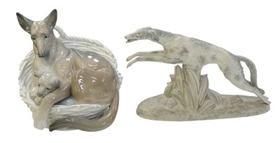 Lot 508 - LLADRÓ; a porcelain figural group of two dogs...