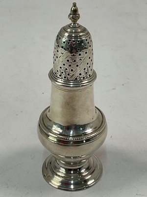Lot 493 - I.D; a Georgian hallmarked silver sugar caster,...