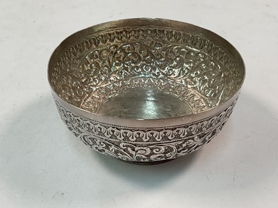 Lot 478 - An Indian white metal bowl with embossed...