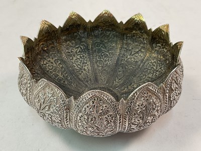 Lot 457 - A Indian white metal bowl with profusely...