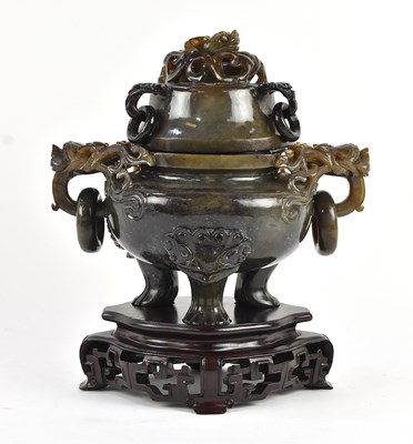 Lot A Chinese carved hardstone twin handled lidded...