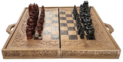 Lot 347 - A modern Oriental carved hardwood folding...