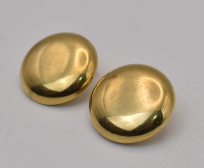 Lot 529 - A pair of 18ct yellow gold round clip on...