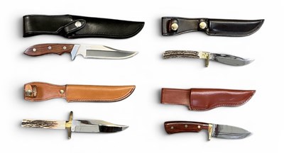 Lot 363 - Four assorted Bowie knives, all with leather...