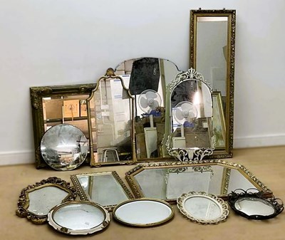 Lot 725 - A collection of thirteen wall mirrors, the...