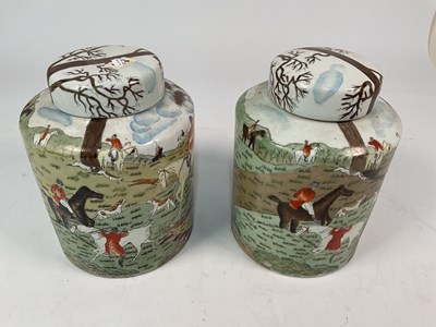 Lot 278 - A pair of ceramic storage jars and covers...