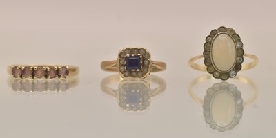 Lot 1329 - Three 9ct yellow gold dress rings comprising...