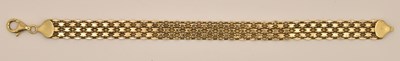 Lot 1418 - A 9ct yellow gold wide bracelet with lobster...