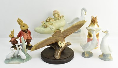 Lot 114 - NAO; three high gloss pottery geese, and a...