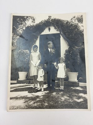 Lot 672 - JAQUELINE KENNEDY; a black and white family...