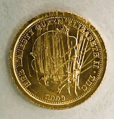 Lot 434 - A 9ct gold Elizabeth II half crown, 2009 0.5g