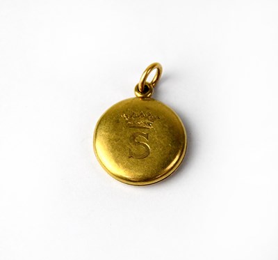 Lot 1033 - A yellow metal locket, initialled 'S' under a...