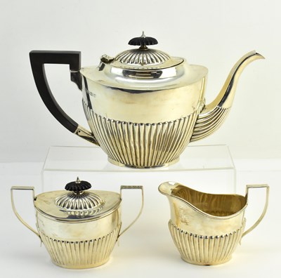 Lot 1127 - BARKER ELLIS SILVER CO; a three piece...