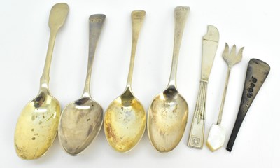 Lot 1239 - Seven items of hallmarked silver cutlery...