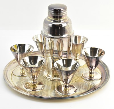 Lot 1110 - WALKER & HALL; an eight piece silver plated...