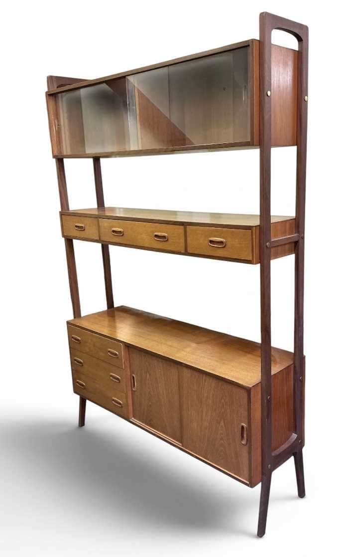 Lot 30 - A teak mid century ladder type three section...
