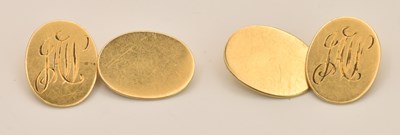 Lot 1397 - A pair of 18ct yellow gold oval face cufflinks,...