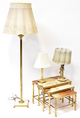 Lot 63 - A mid-20th century brass and onyx-topped nest...