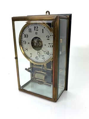 Lot 1351 - BULLE PATENT; a brass electric wall timepiece,...