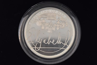 Lot 1492 - THE ROYAL MINT; a cased encapsulated £5 silver...