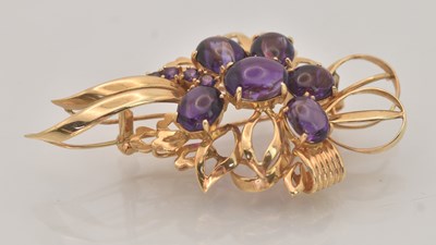Lot 1403 - A 14ct yellow gold floral brooch, with six...