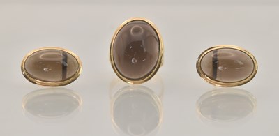 Lot 1269 - A 14ct yellow gold ring, with an oval bezel...