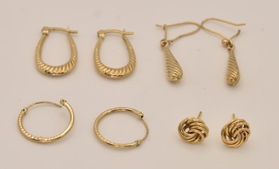 Lot 1394 - Four pairs of 9ct yellow gold earrings,...