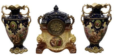 Lot 148 - An early 20th century hand painted porcelain...