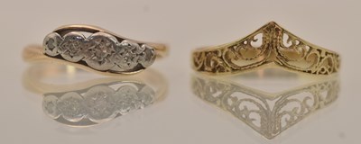 Lot 1336 - Two 9ct yellow gold dress rings, one with a...