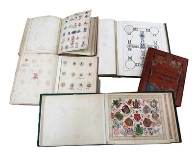 Lot 364 - Five albums of crests, monograms and coats of...
